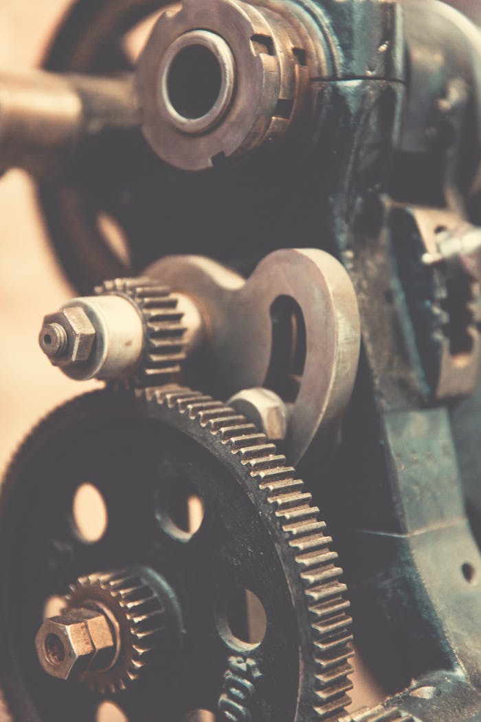 Detailed view of vintage industrial machinery gears showcasing precision engineering.
